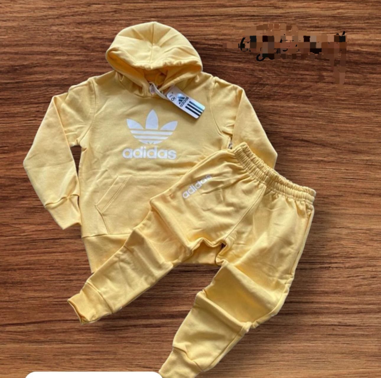 580 Adidas amarillo